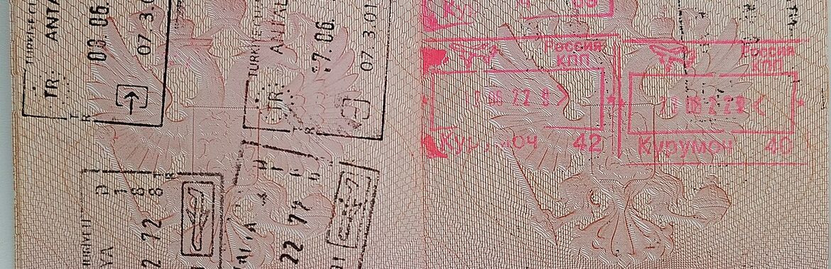 Passport with international entry and exit stamps